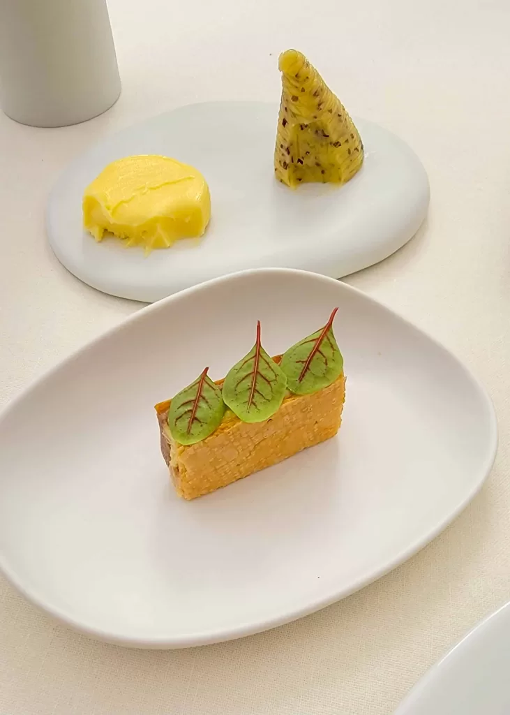 fancy looking food at a two michelin star restaurant in Milan