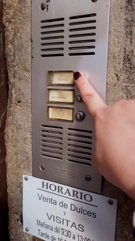 ringing doorbell for buying nun cookies in madrid