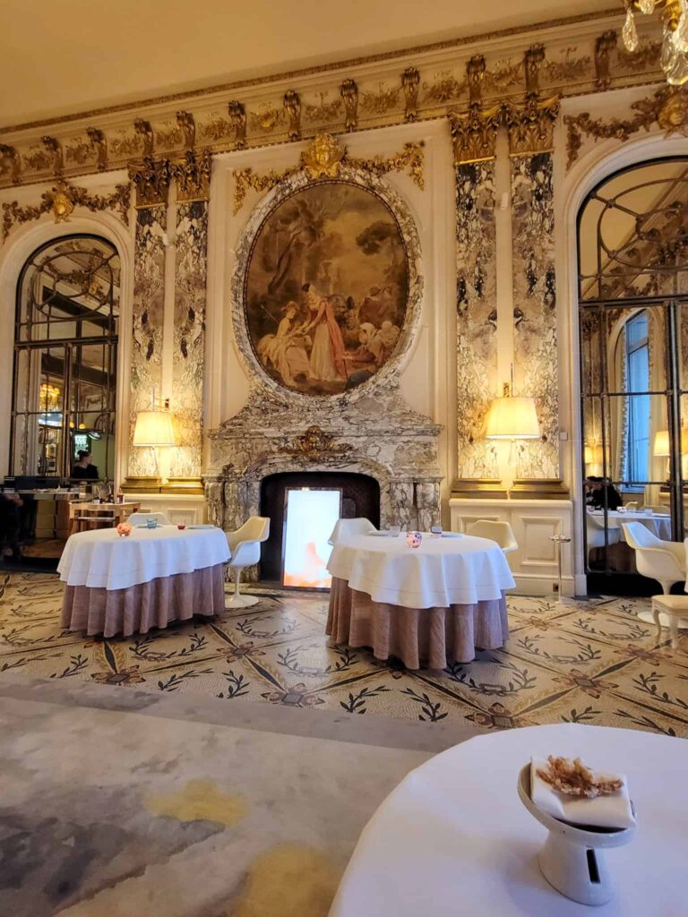 the interior decor of a 2 star michelin restaurant in paris