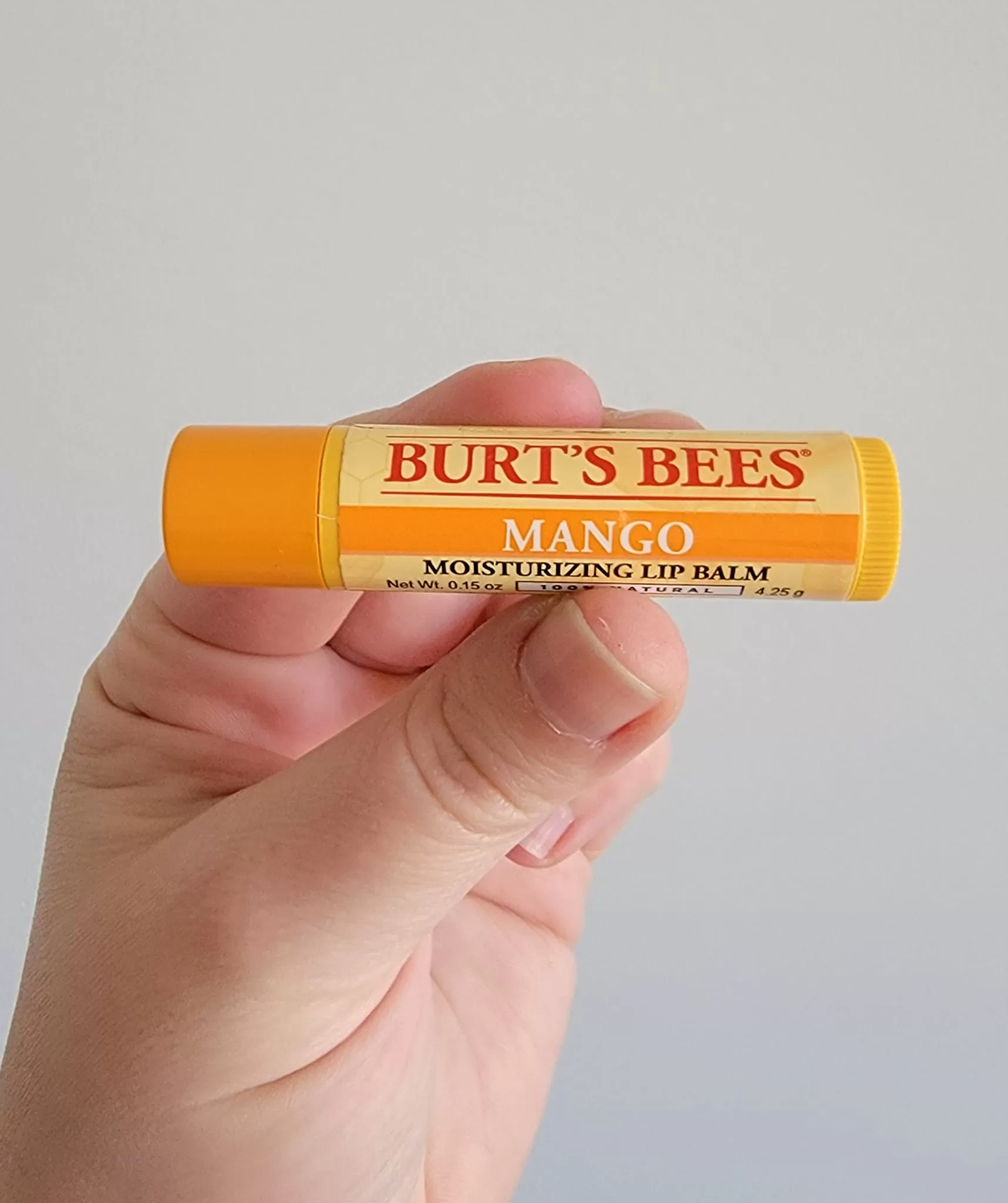 burt's bees mango lip balm, one of the travel essentials for women