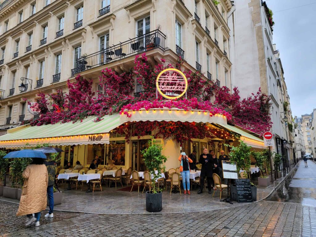 colorful cafe in le marais neighborhood in paris