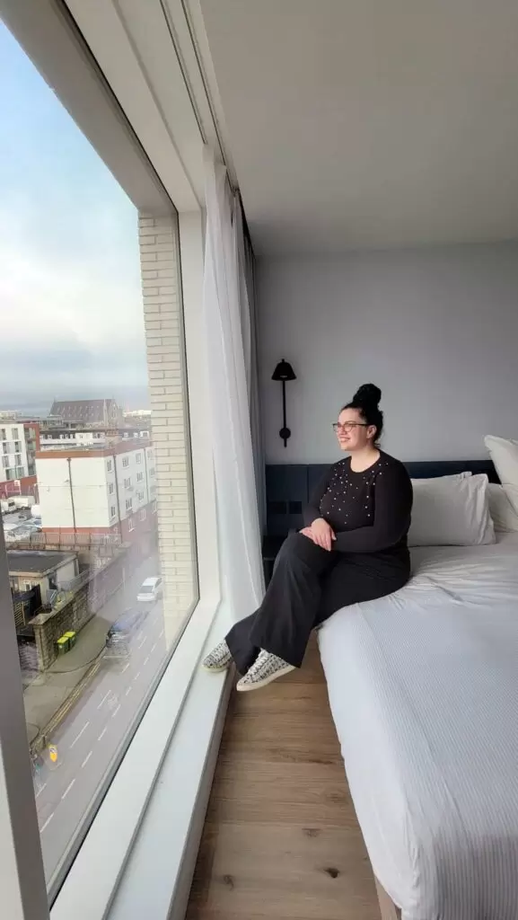 me sitting down on a bed in a hotel in dublin