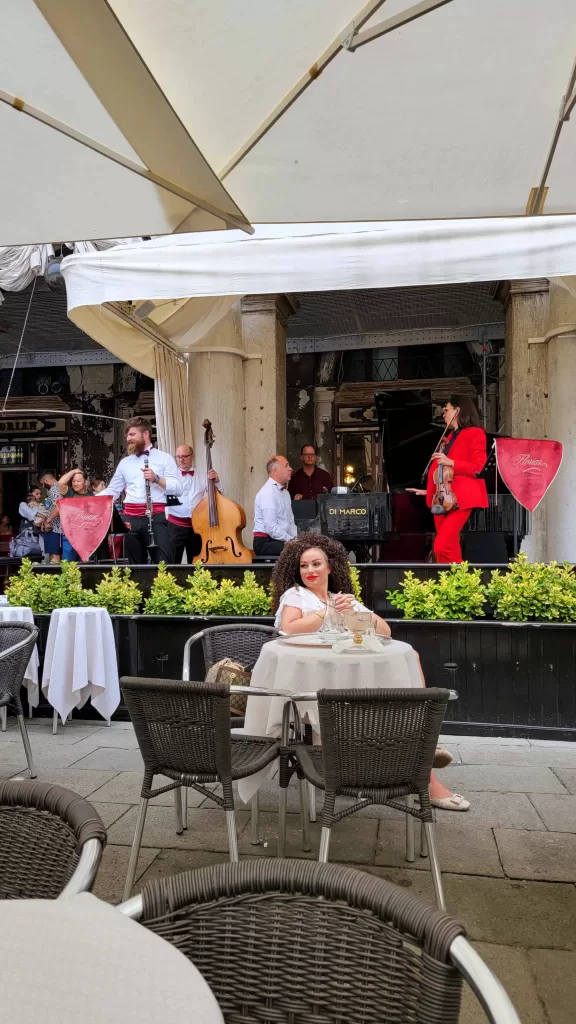 outdoor sitting at cafe florian in venice, one of the many instagrammable places in Italy