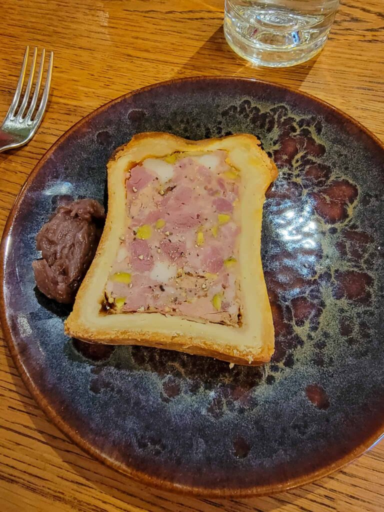 plate with pate en croute at a restaurant in paris