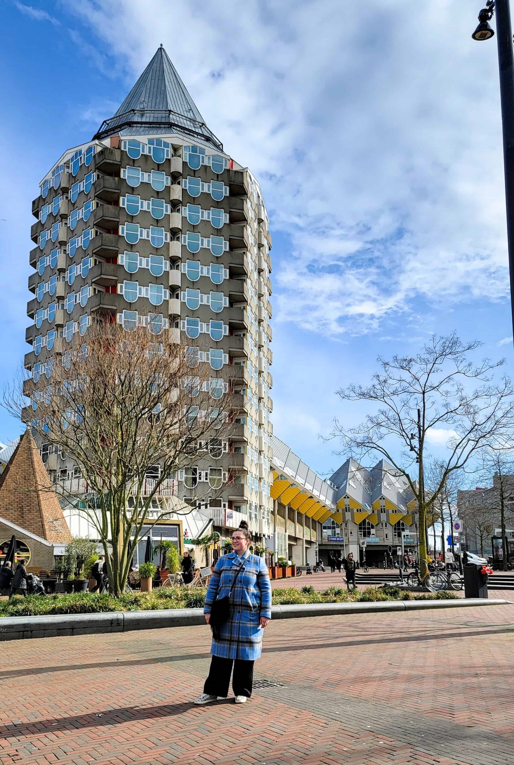 me in front of the yellow cube houses in rotterdam