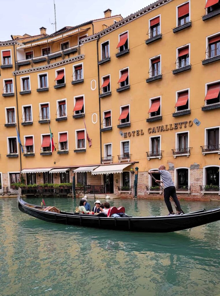 people on a gondola ride in venice