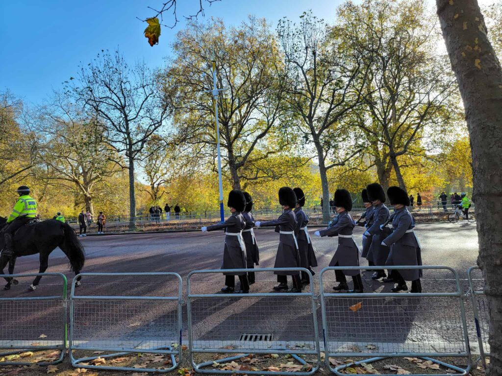 soldiers marching at changing of the guards at buckingham palace