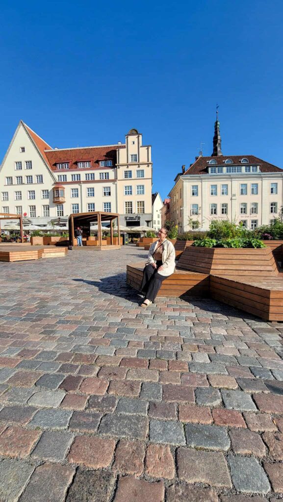 the author at town hall square in tallinn