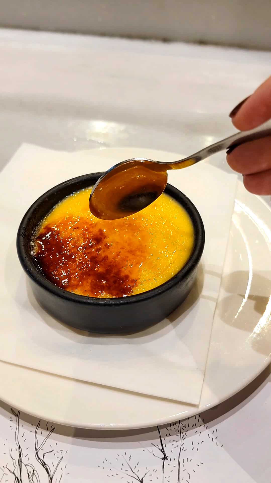 crema catalana at a restaurant in barcelona