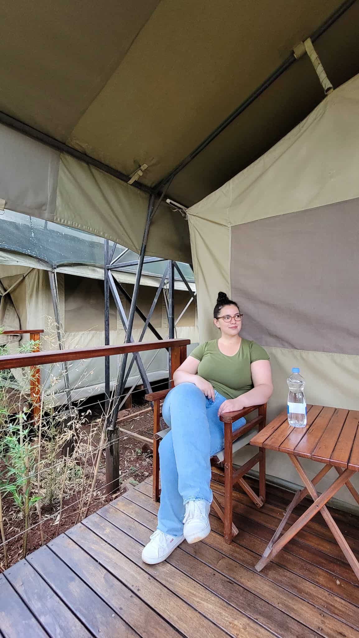 the author in front of the tent at wildebeest eco camp, one of the best kenya safari lodges