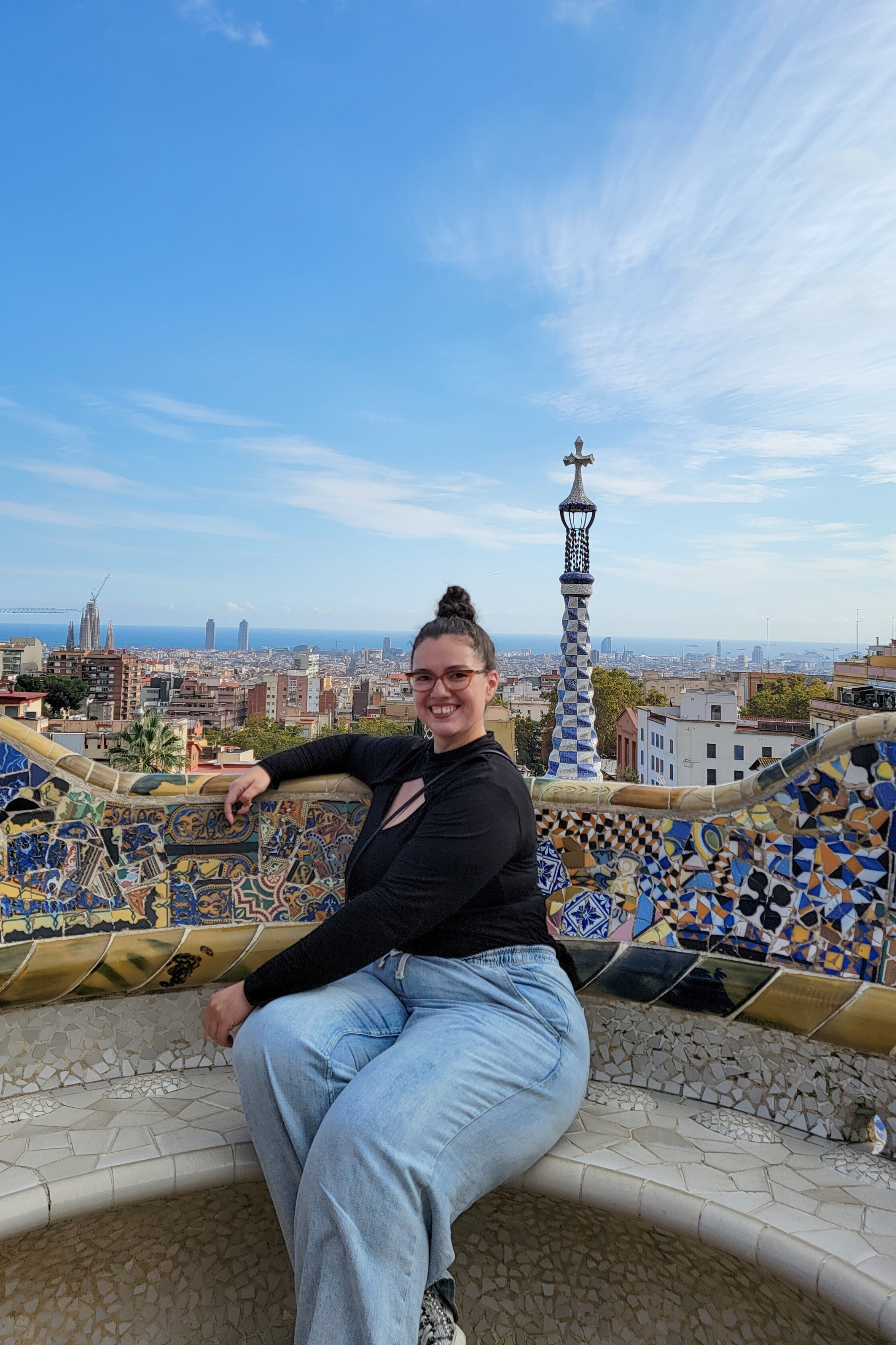 the author of thesolotravelinstyleblog.com in Park Guell in Barcelona