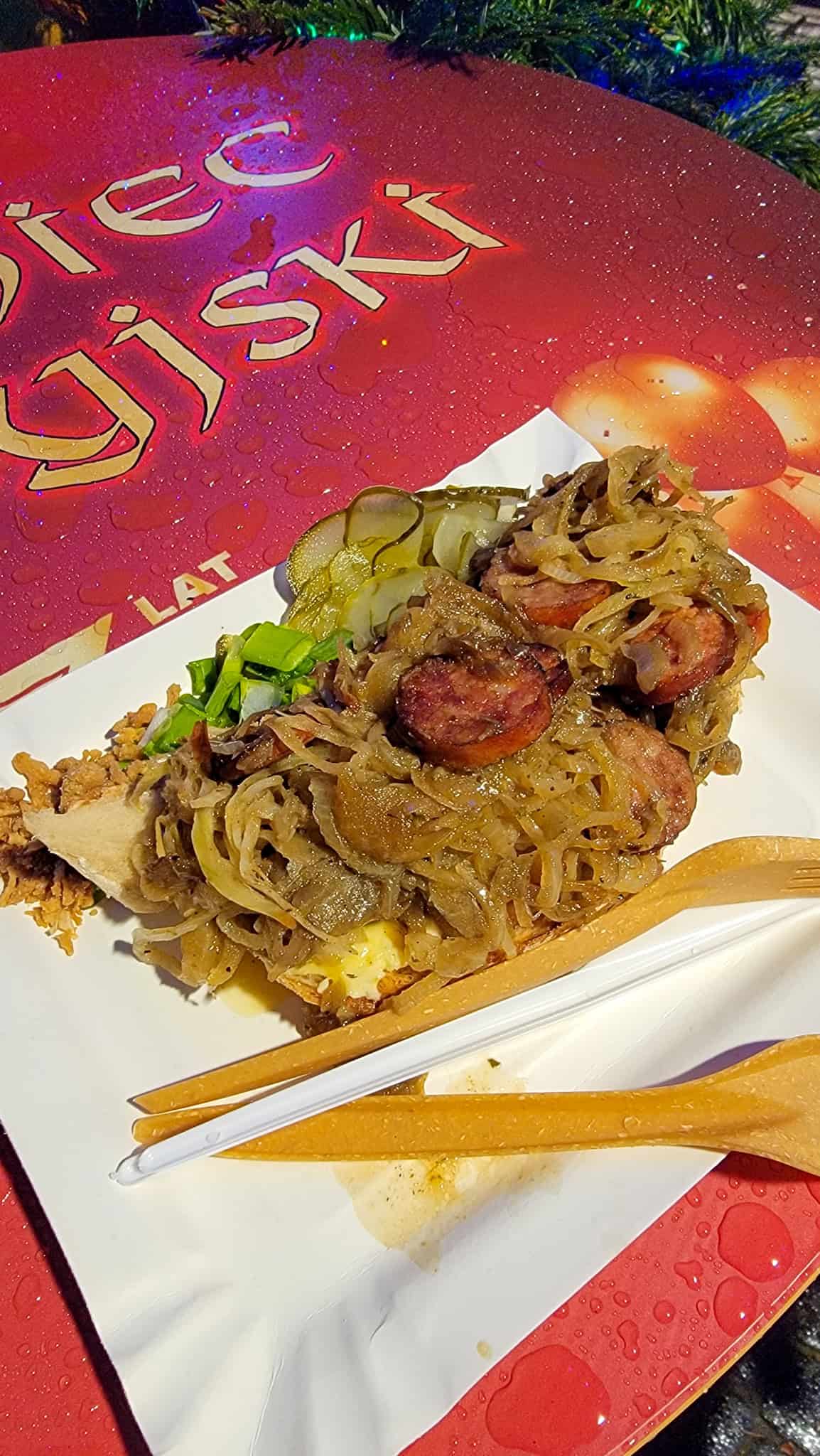 bread with sausage and onion at the warsaw christmas market