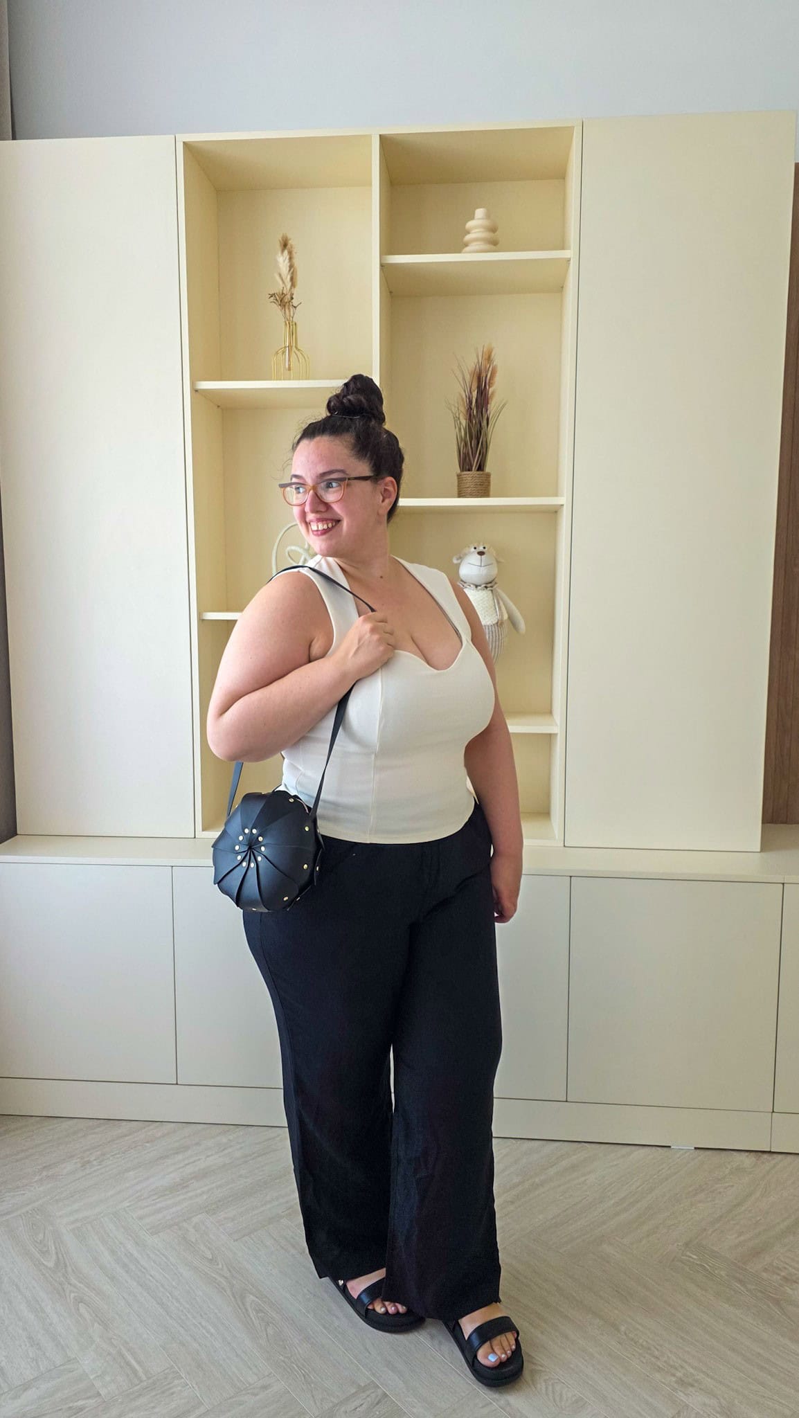 the author with a purse from atelier madre barcelona