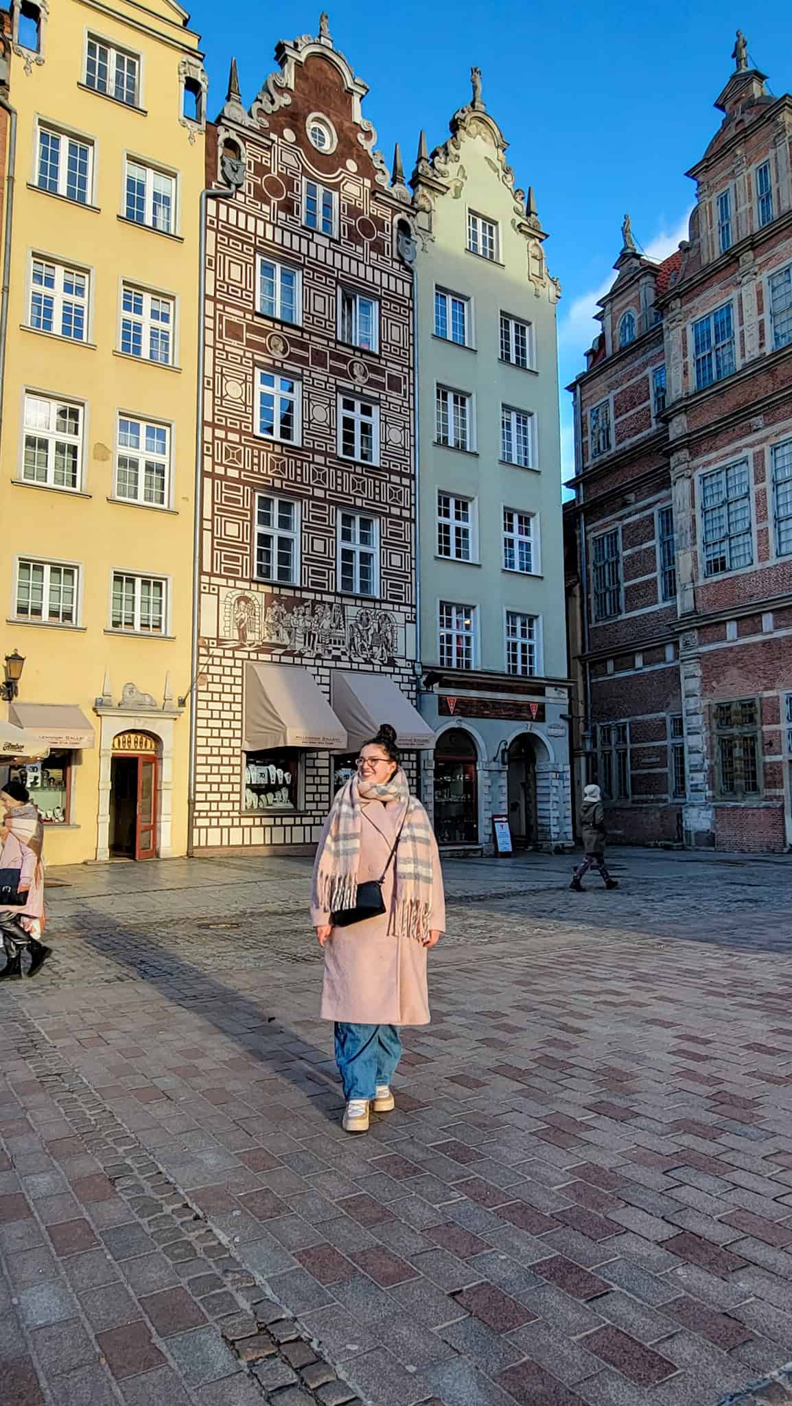 the author in gdansk old town, the first stop when you explore gdansk in one day