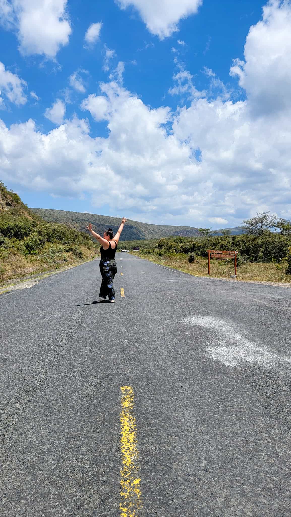 the author in the middle of a road in kenya