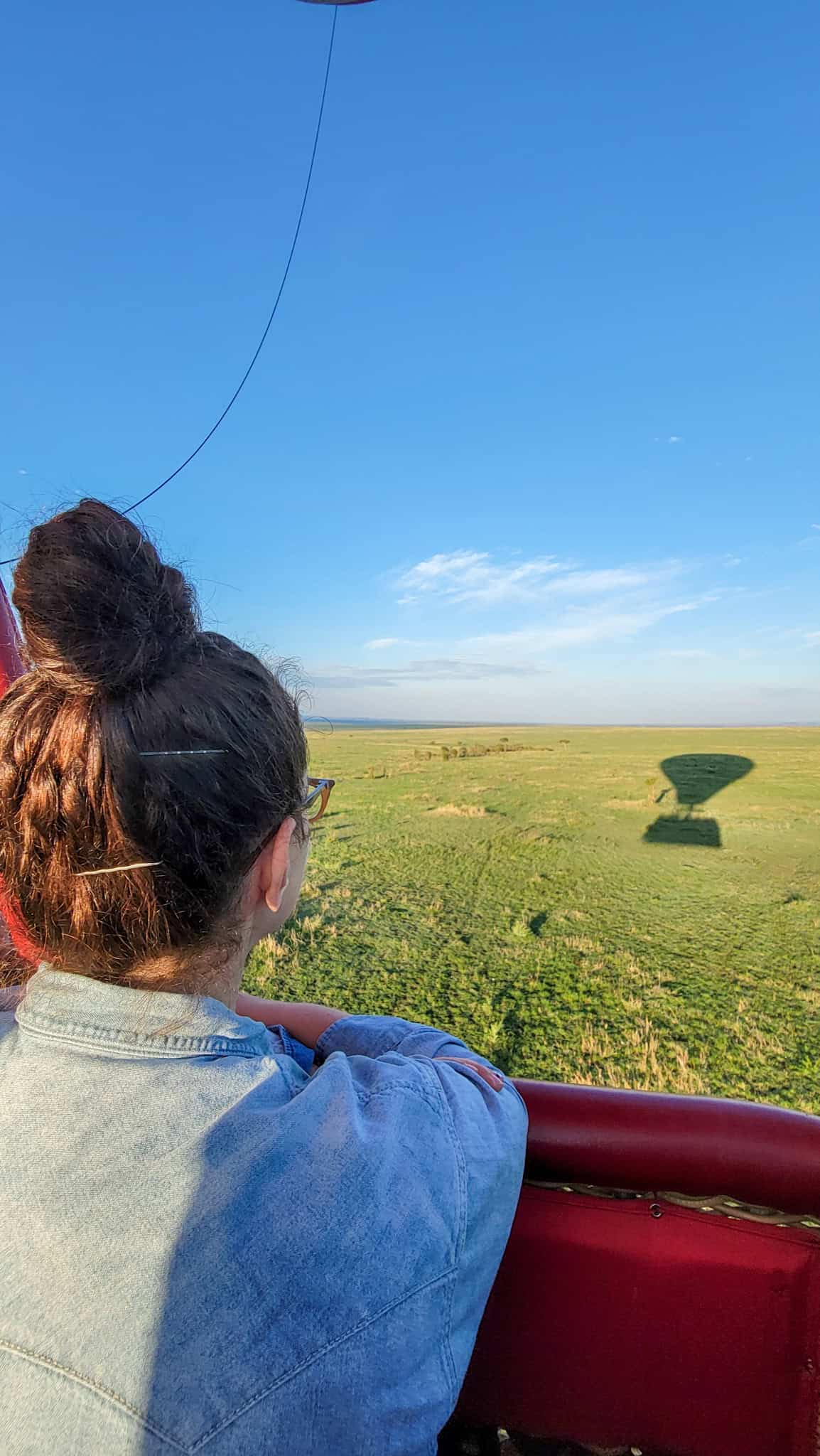 the author on a hot air balloon ride over the maasai mara