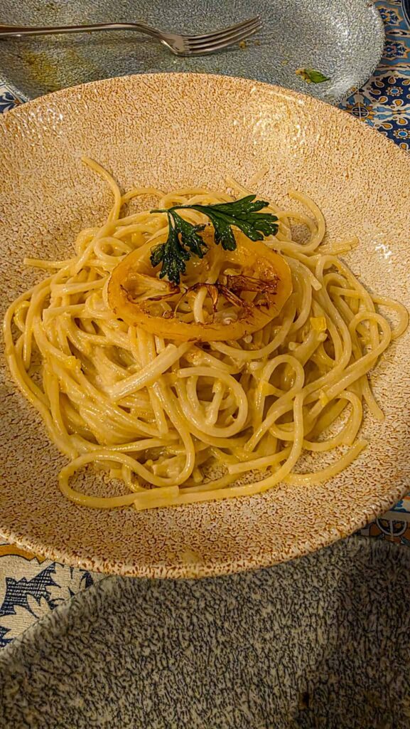 a plate of lemon pasta