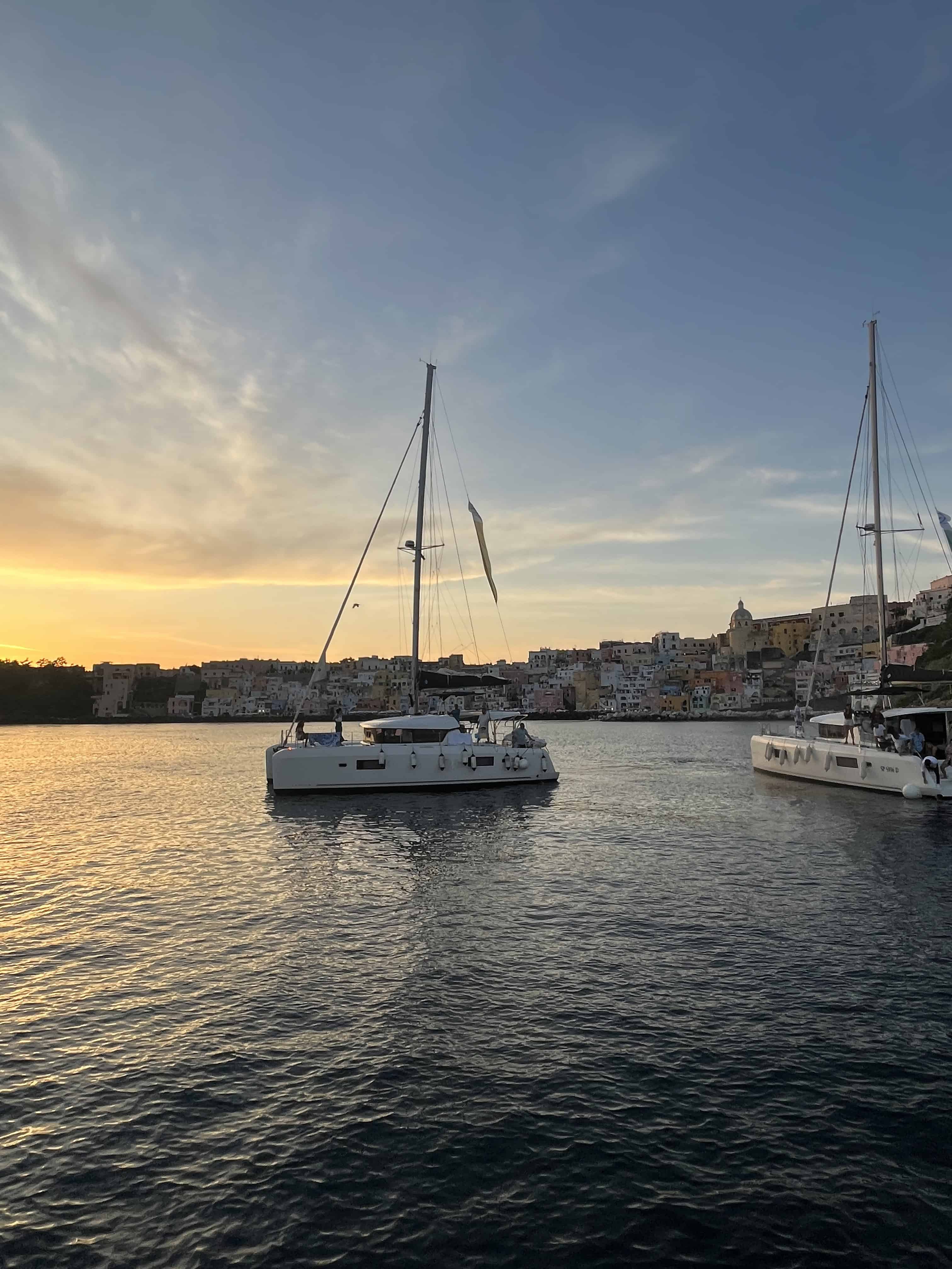 sunset and a boat in amalfi