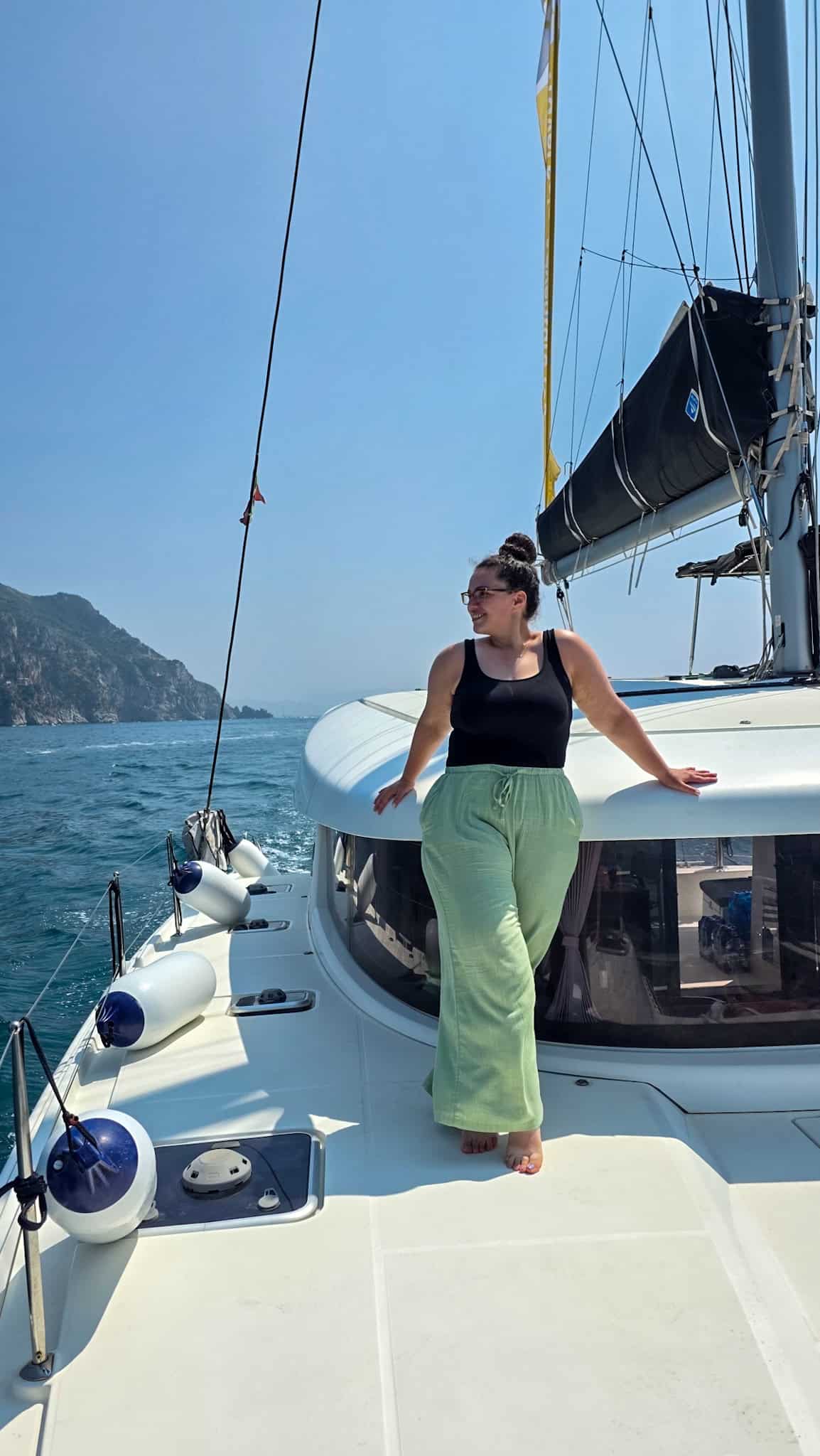 the author on a boat on the amalfi coast sailing trip