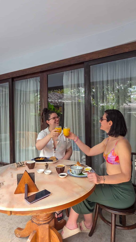 the author and a friend having breakfast at villa samadhi kuala lumpur