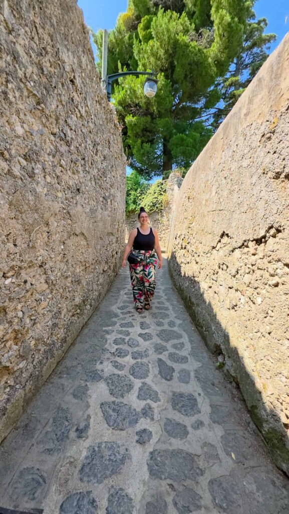 the author on a cobblestone street in ravello