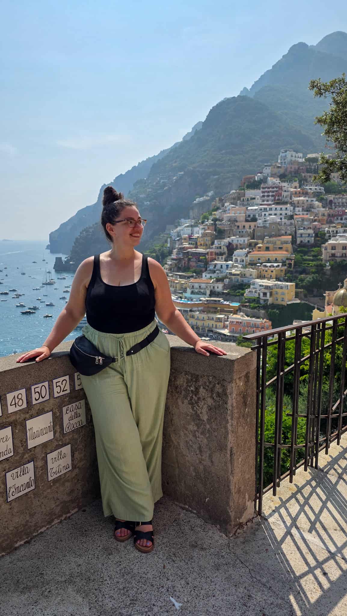 the author and the colorful houses in positano