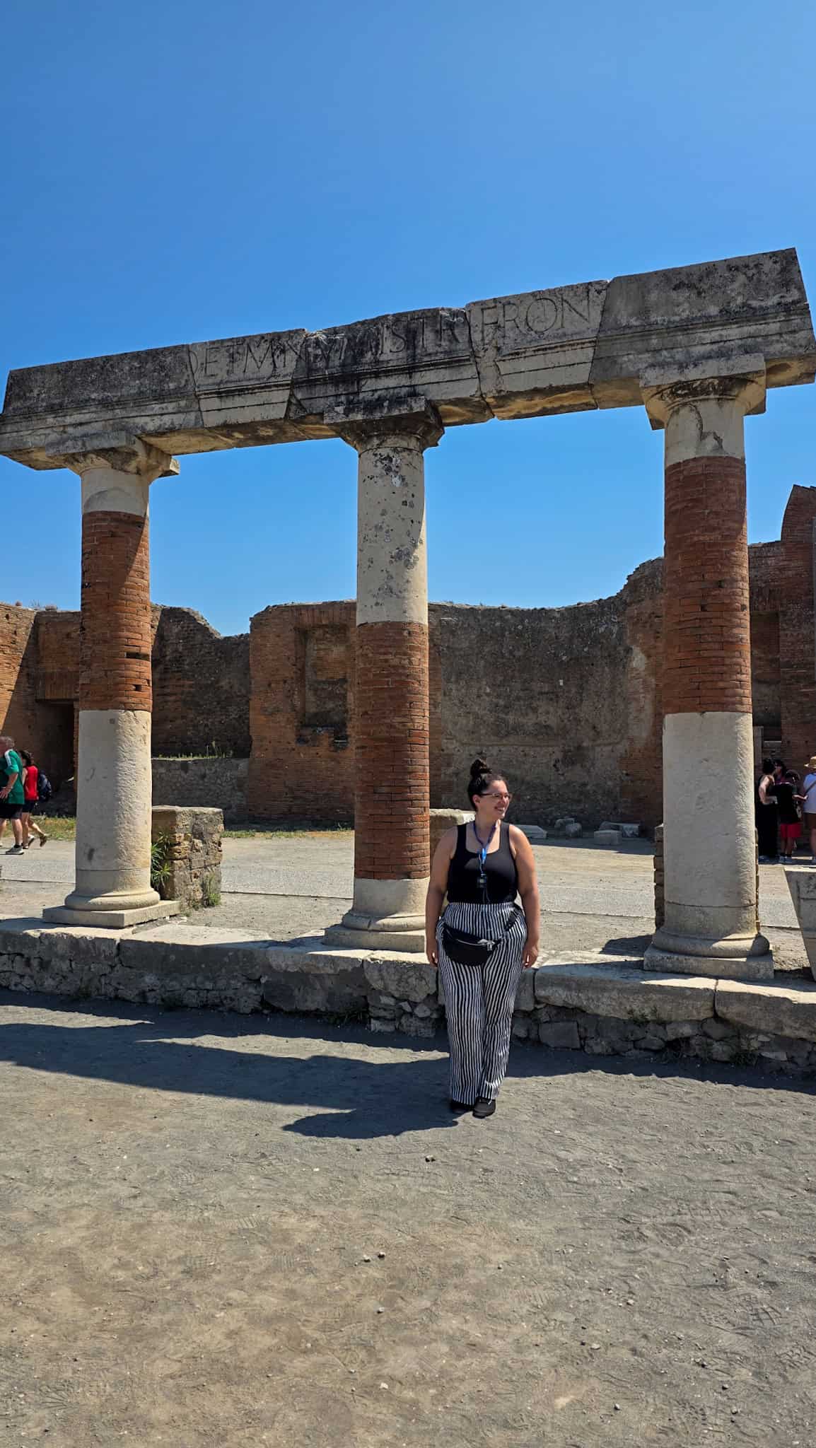 the author by a ruin in pompeii