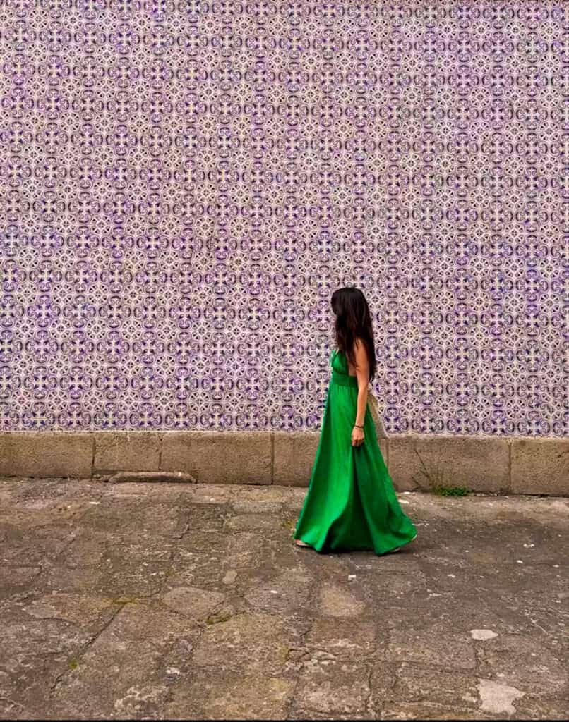 the author by azulejo tiles in porto