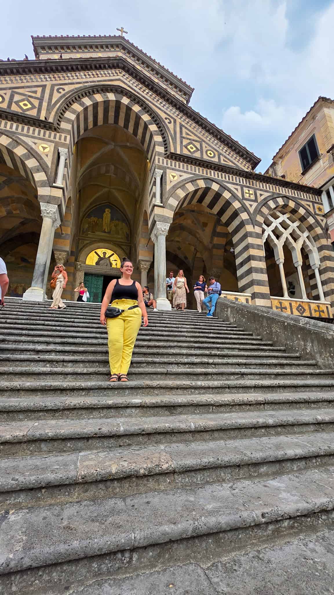 the author on the steps of the amalfi cathedral, a stop on the amalfi one day itinerary