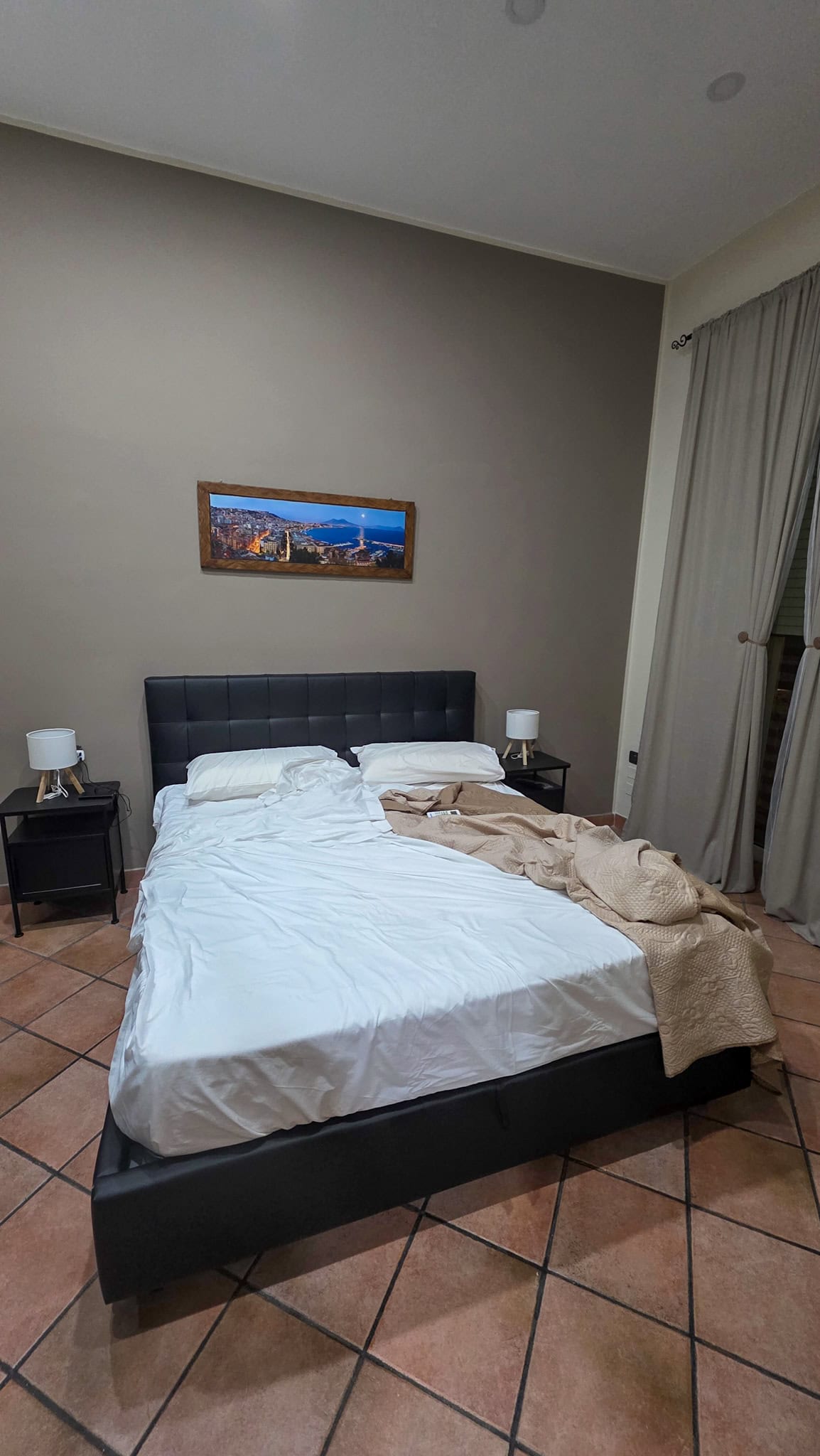 the bedroom at dimora carafa in naples