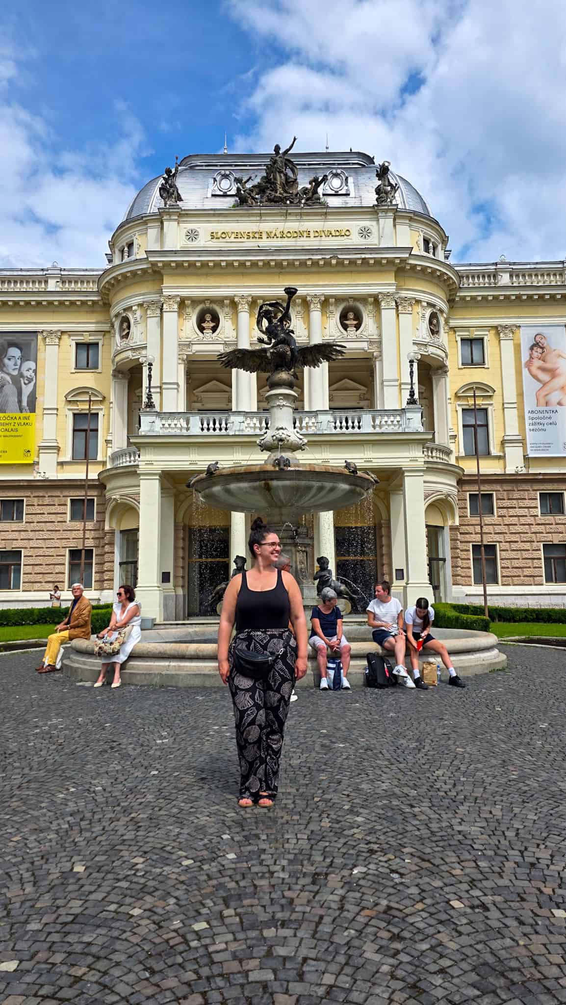 the author in front of the slovak national theatre in bratislava