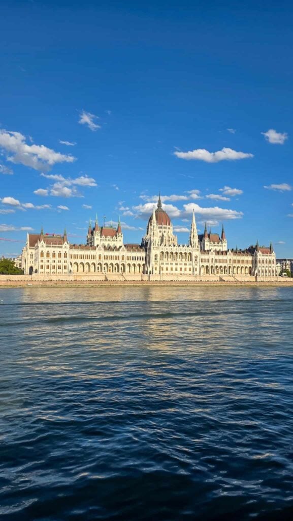 the hungarian parliament building seen from a danube cruise in budapest