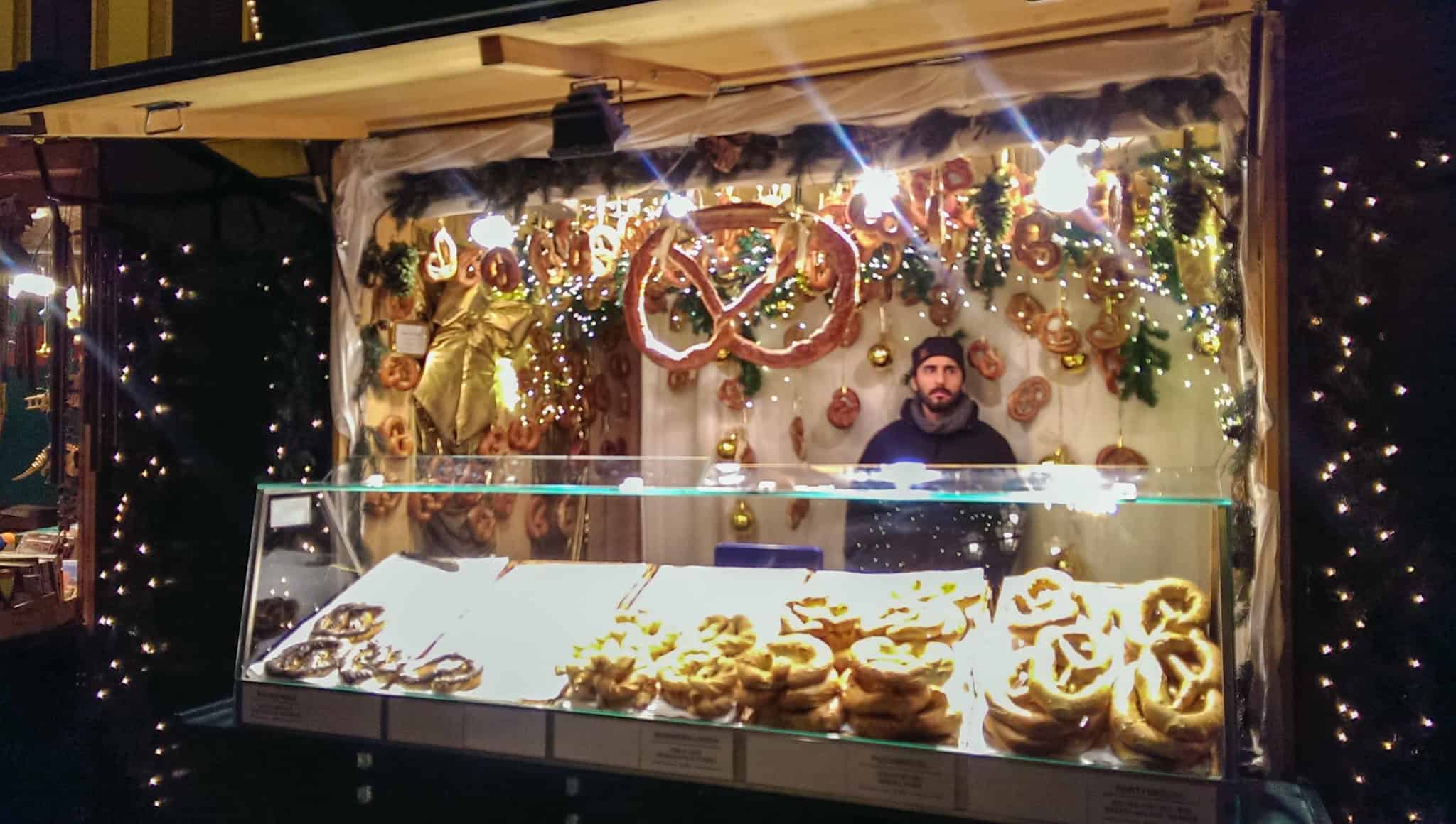 a stall selling pretzels at vienna christmas market