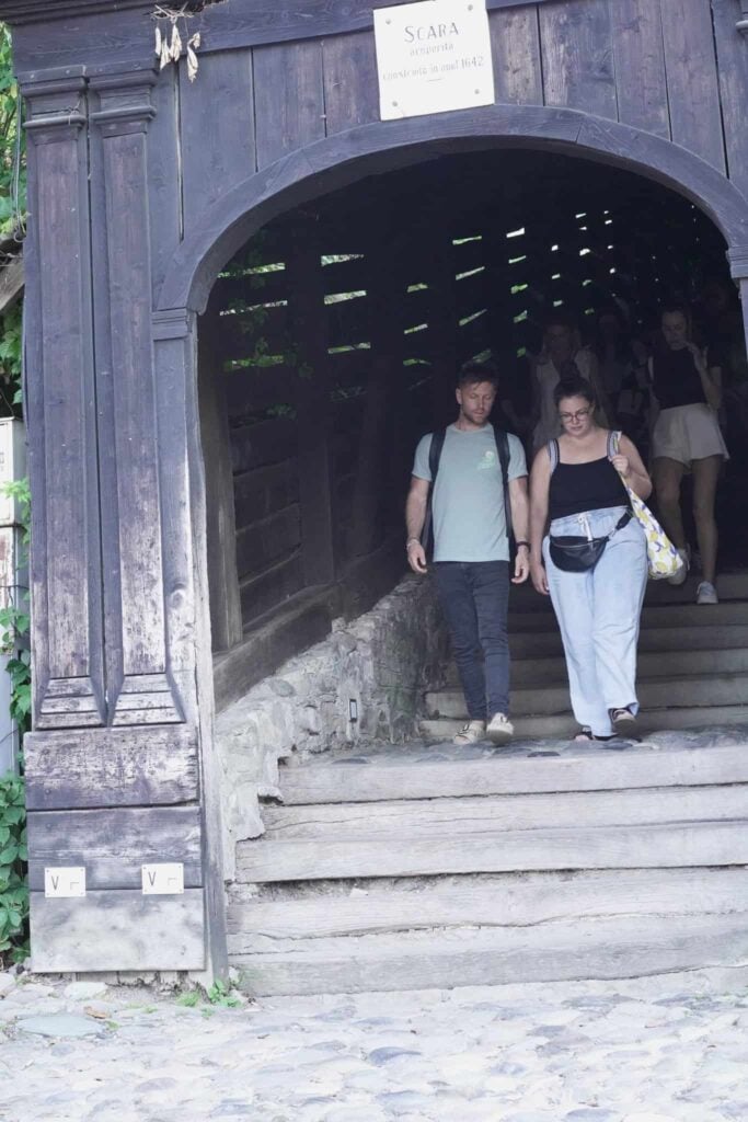the author and a friend at the entrance to the covered staircase in sighisoara