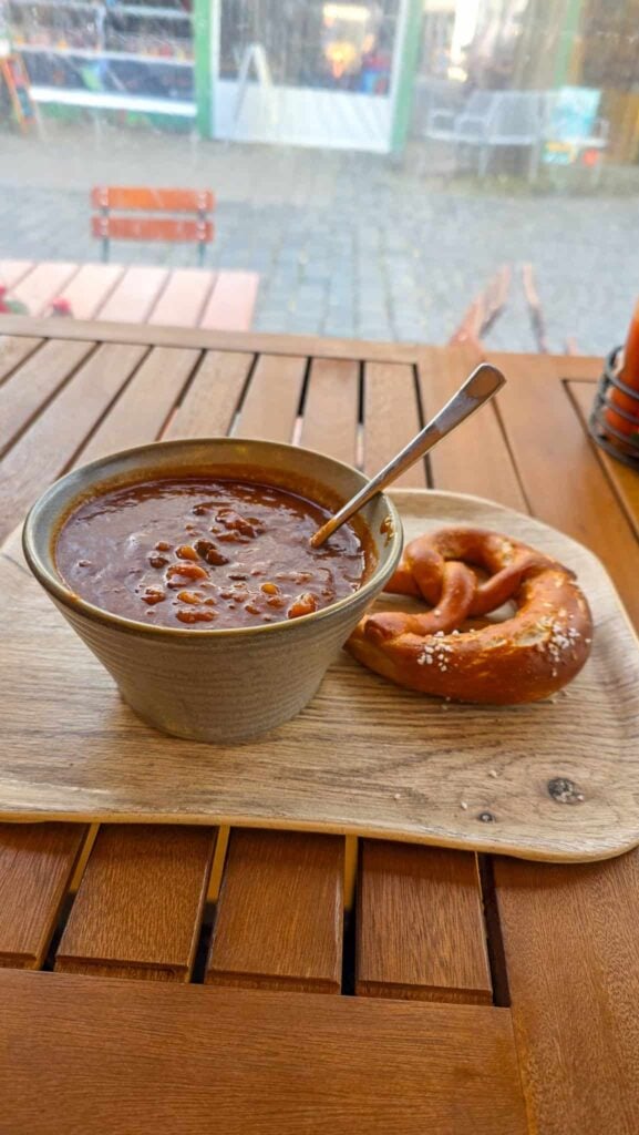 soup and pretzel at a restaurant in munich