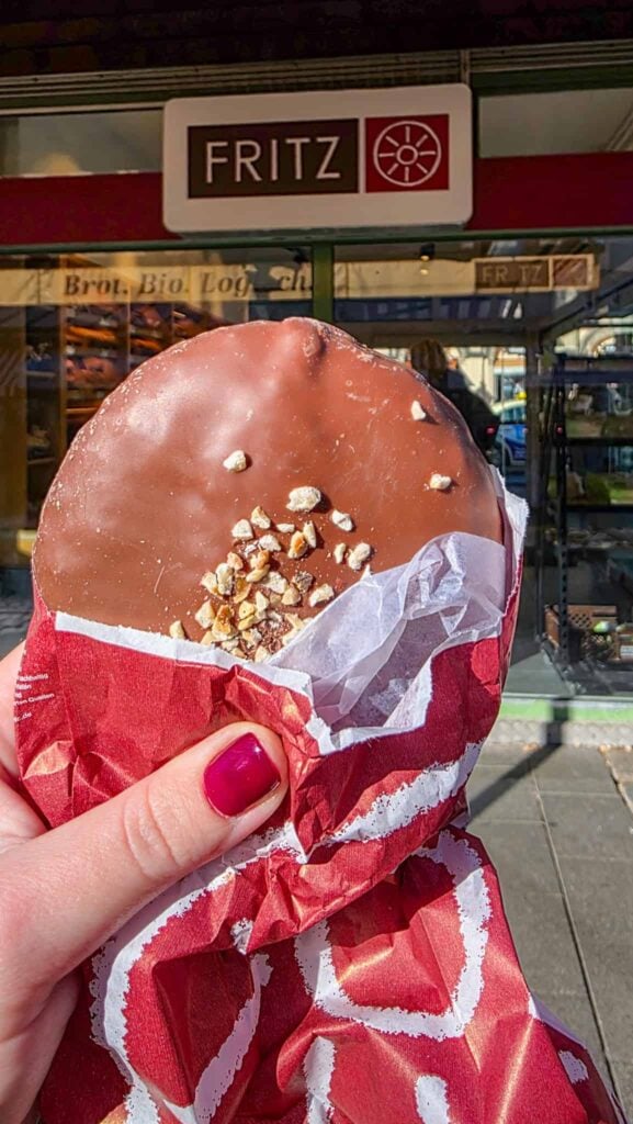 the author holding a gingerbread in munich