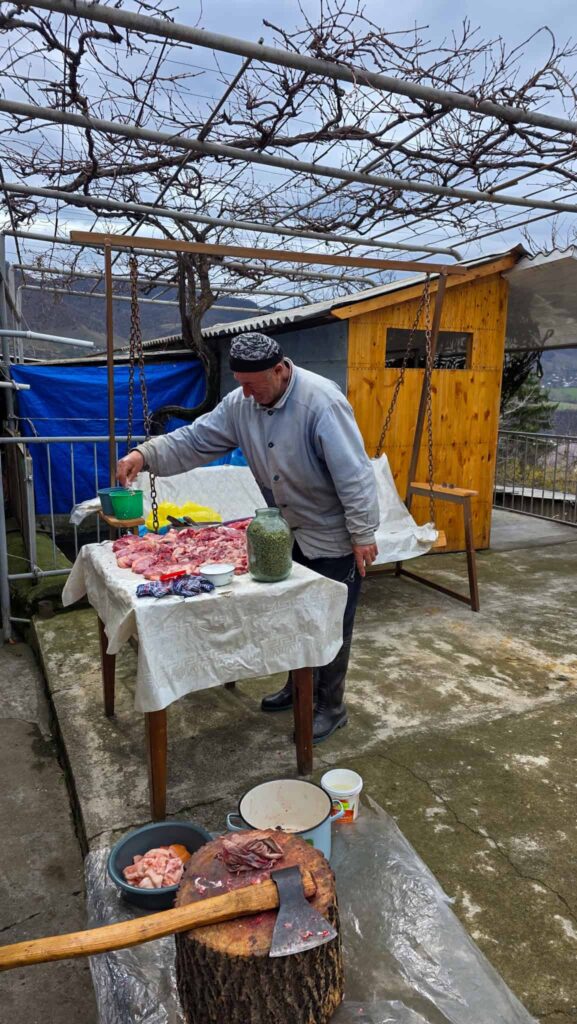 armenian men preparing meat for lunch
