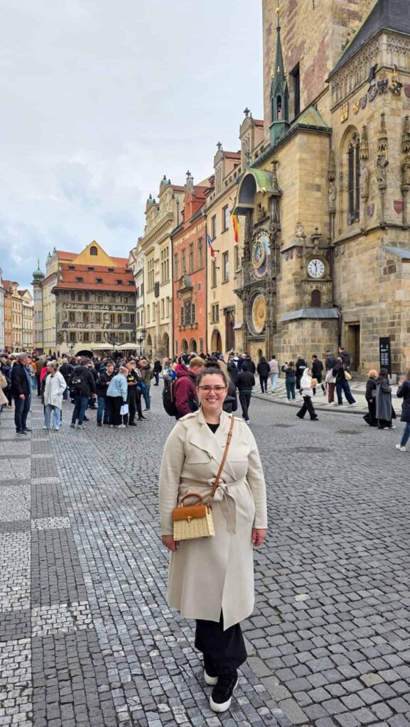 the author at the astronomical clock in prague