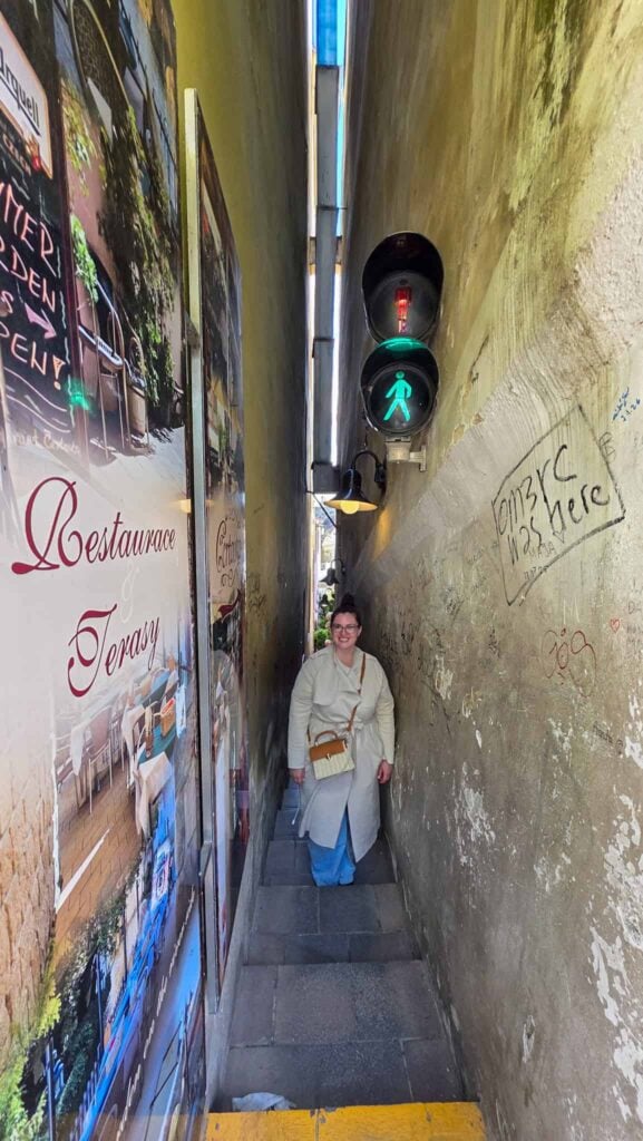 the author on the narrowest street in prague