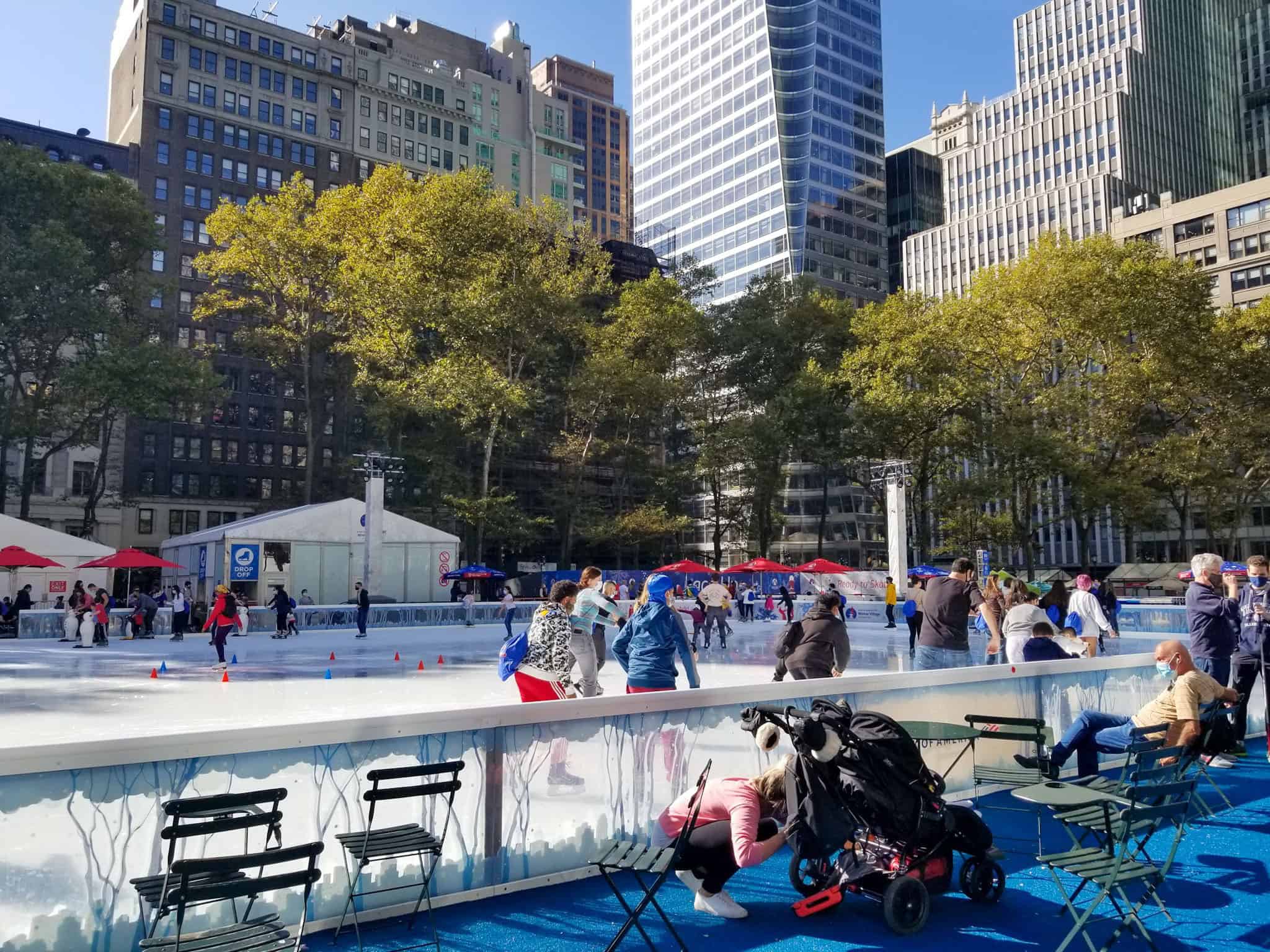 people ice skating at bryant park